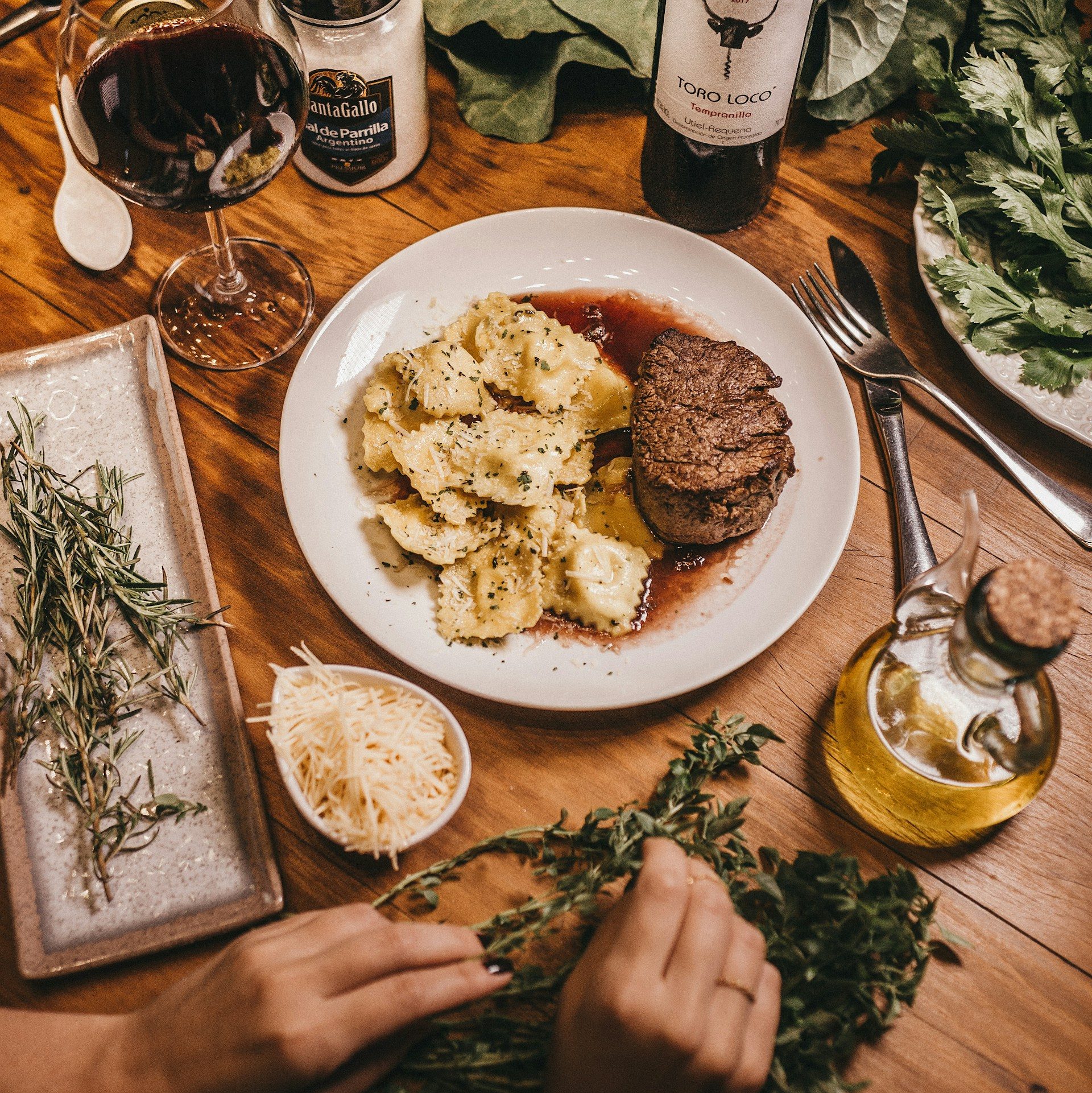 plate of pasta and patties